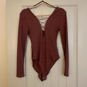 Burgundy laced chest bodysuit. New with tags.